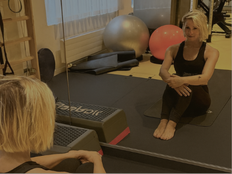 Portrait d'Aurelia, instructrice de Pilates expérimentée